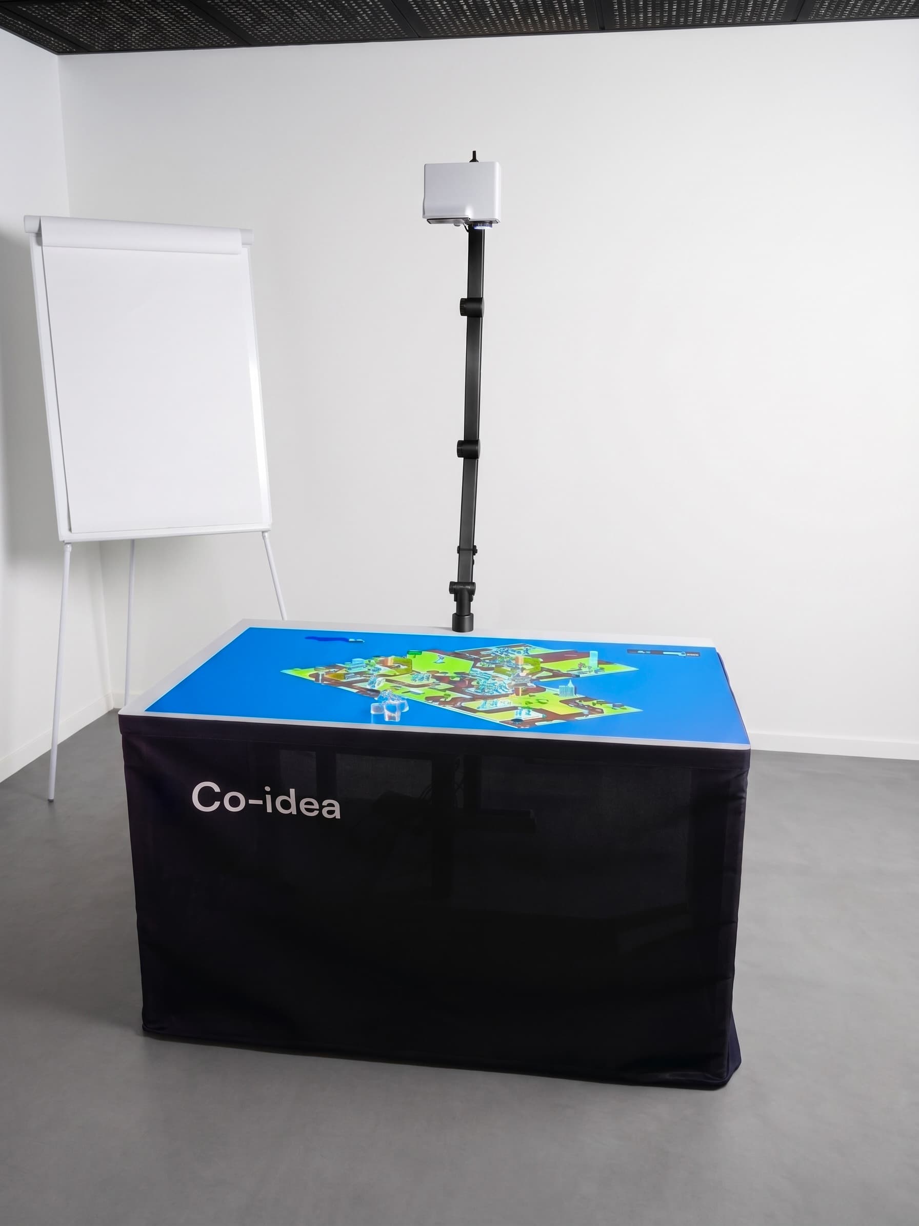 CARDS projector above a table displaying an interactive map
